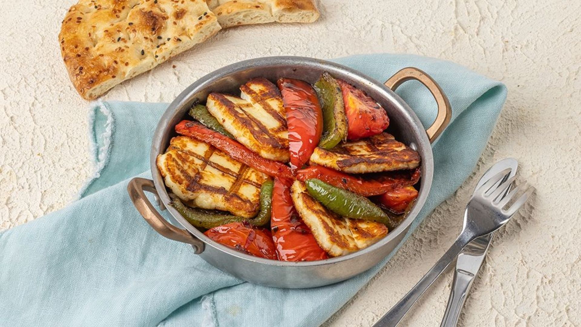 Sautéed halloumi with tomato and capsicum