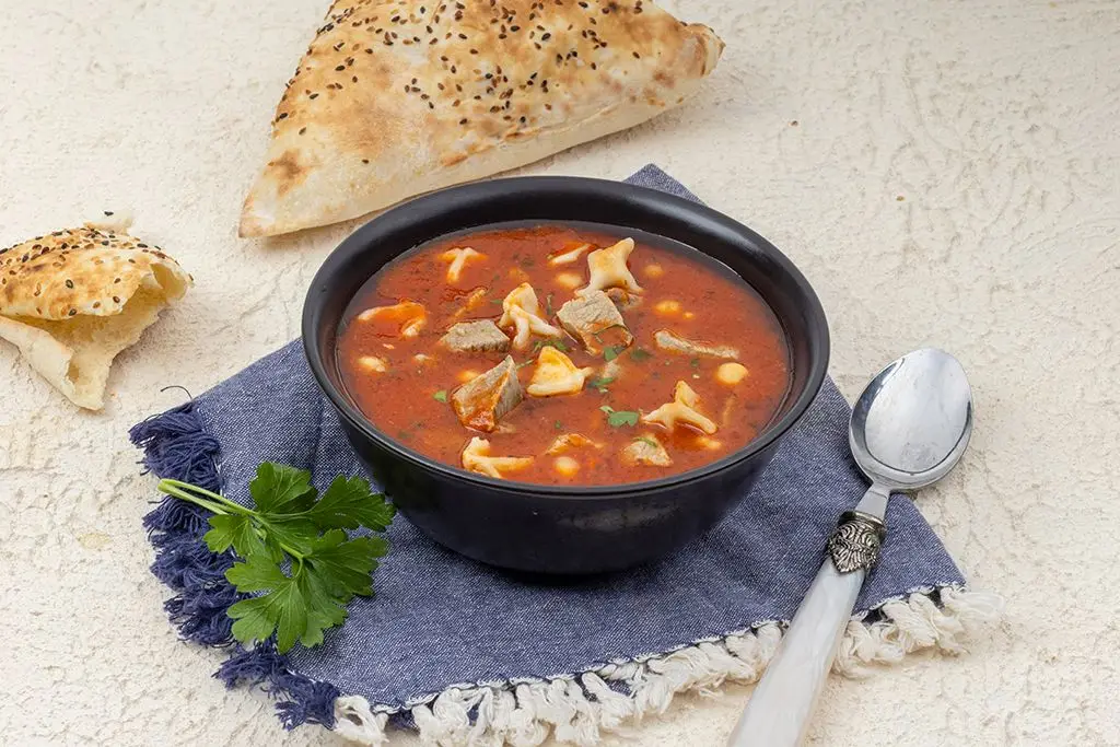 Yuzuk Corbasi (Meat Stew and Manti)